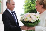 Меркель не видит Путина в G8